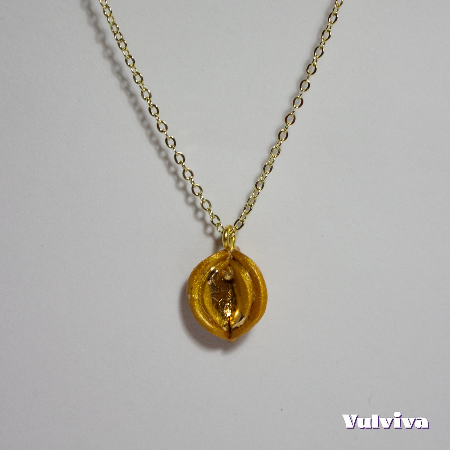 Golden Glittoris Halskette